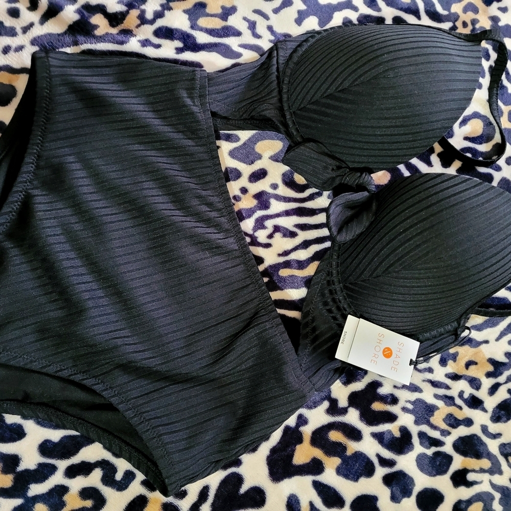 One piece black bathing suit